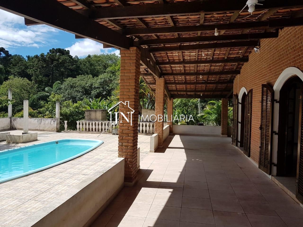 Foto 2 de Chácara à venda com 3.300 m², piscina, lareira e escritura · Ref. 1869